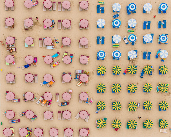 Aerial View of sunshades standing in the sand