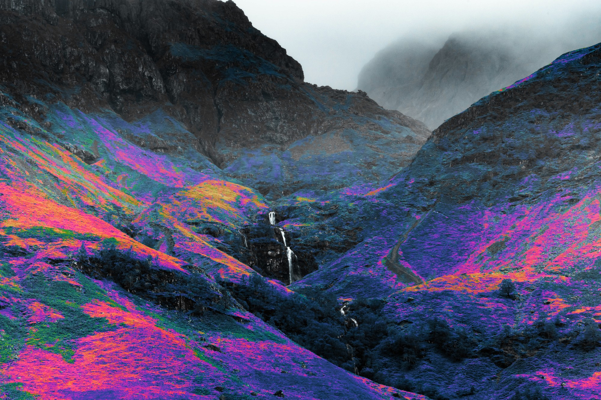 Stunning infrared photography landscape of the highlands mountains in Scotland.