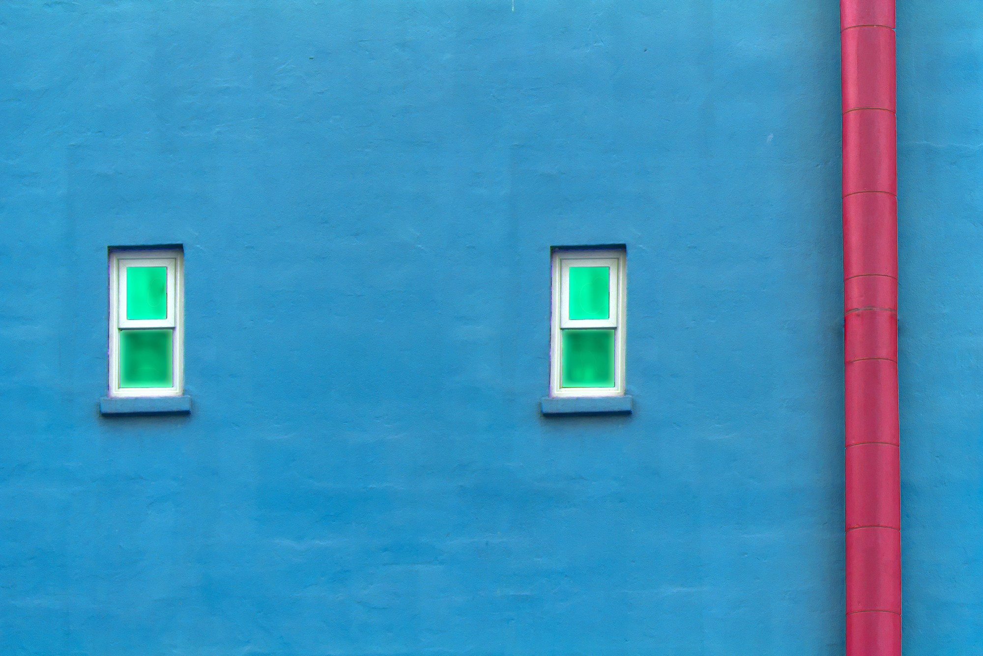 Red pipe on Blue Wall