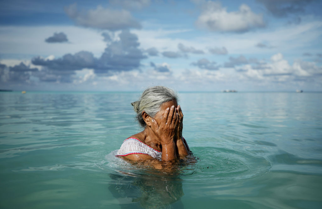 Rising Seas (Hands on Face)
