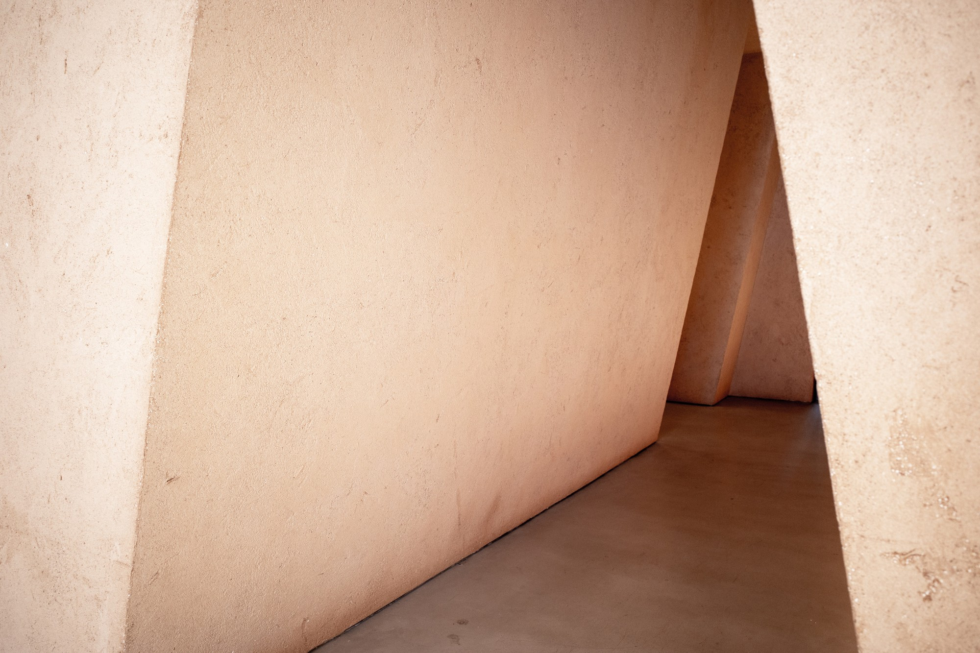 Light and shadow in the corner of gray interior concrete building