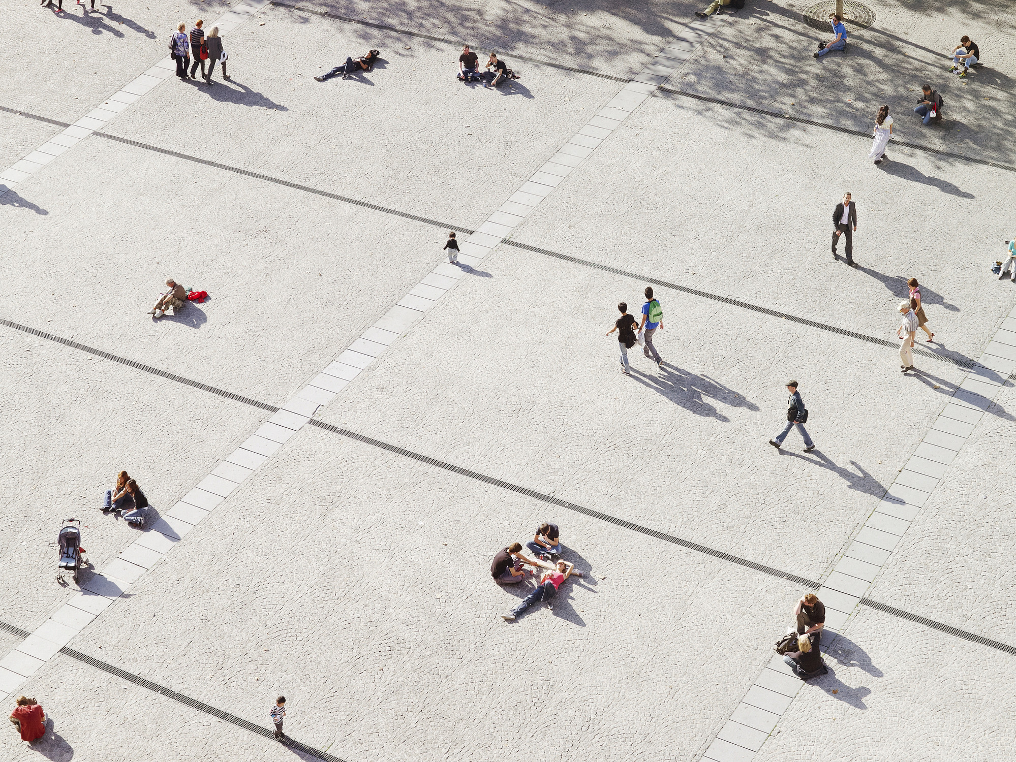 people in city seen from above, aerial