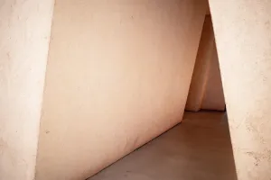 Light and shadow in the corner of gray interior concrete building